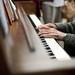 Donna Hewitt plays the piano outside of Sidetrack Bar and Grill in Ypsilanti on Tuesday. Daniel Brenner I AnnArbor.com
